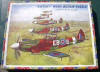 This wooden "Victory" jigsaw puzzle in the 'Topical Series' of "Spitfires in Flight", was made in England by G. J. Hayter and Co. Ltd., Boscombe, Bournemouth, and shows 41 Squadron aircraft. It originally cost 5/9 (five shillings & nine pence), including purchase tax (ca. 28p in modern UK currency). This magnificent collectors' item was purchased recently (July 2004) by Allan Hillman <allan.hillman@btinternet.com>, who is also the source of this picture. [Note the incorrect camouflage colour chosen by the artist/manufacturer]
