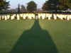 The shadow made by the Cross of Honour in the morning sun fell directly across Joseph's Grave in the front row